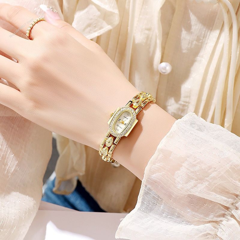 Montre Femme Élégante Quartz Cadran Ovale Sertie de Strass et Cristaux