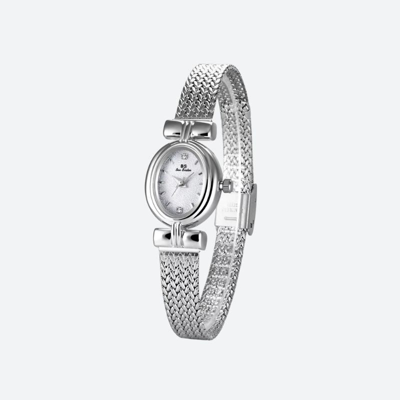 Montre Femme Élégante Quartz Petit Cadran Ovale et Bracelet Maille Tressée