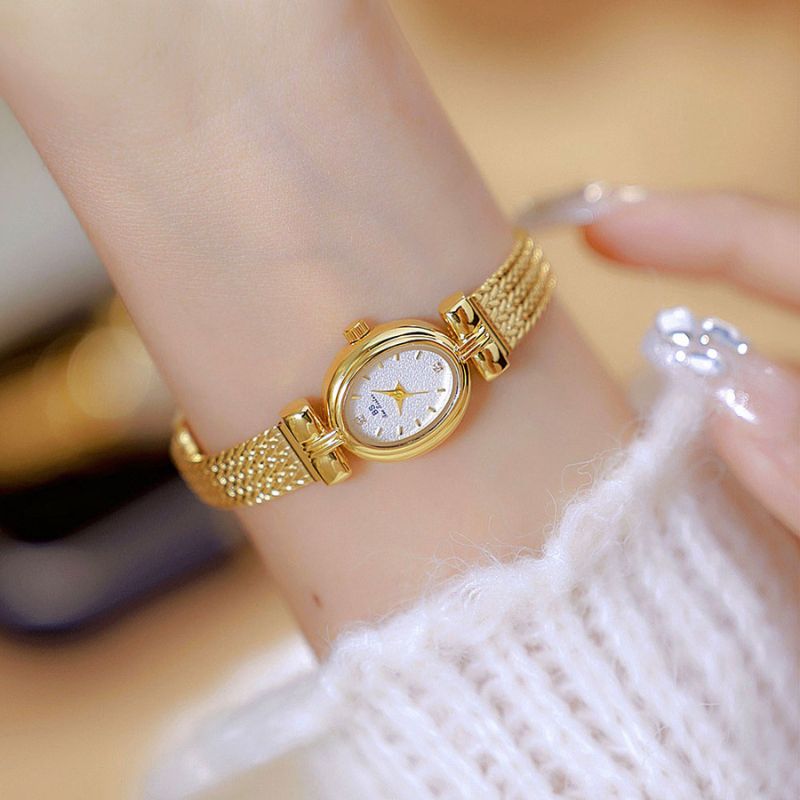 Montre Femme Élégante Quartz Petit Cadran Ovale et Bracelet Maille Tressée