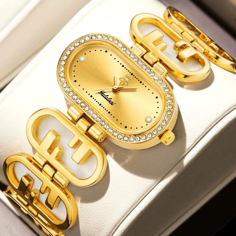 Montre Femme Ovale Dorée Bracelet Graphique