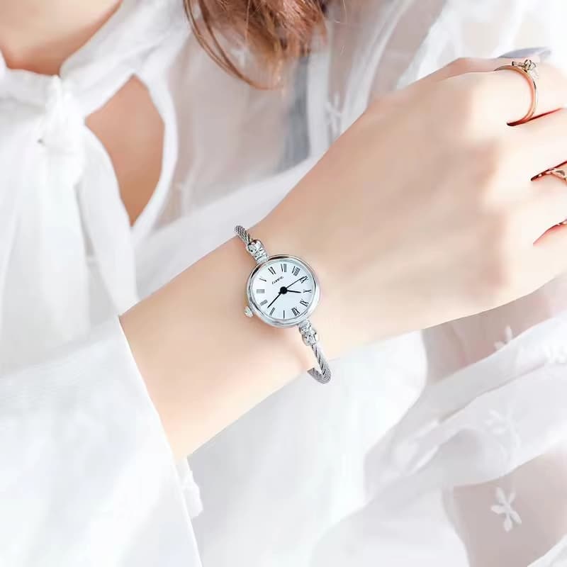 Montre Femme Quartz Rétro Ronde Acier