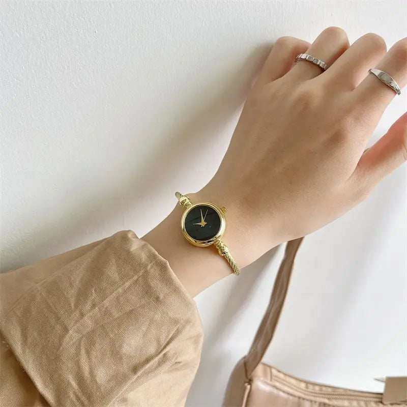 Montre Luxe Quartz Femme Bracelet Jonc Torsadé Style Bijou